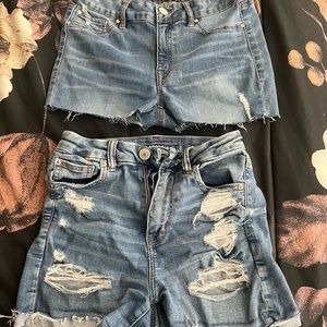 2 pairs of women’s jean shorts-size 4. Top pair rampage & bottom American eagle